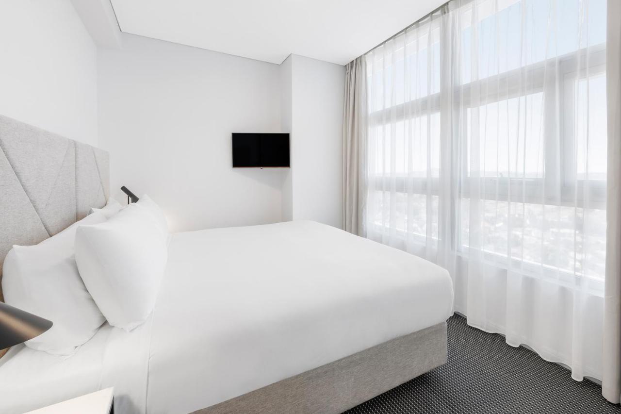 Meriton Suites Zetland Sydney Ngoại thất bức ảnh A bedroom at the hotel